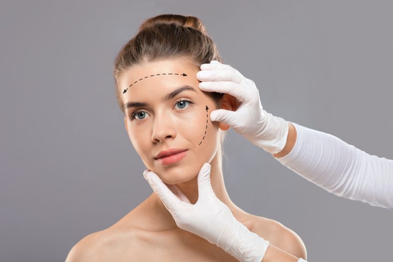 Young lady with face marks getting treatment at beauty clinic